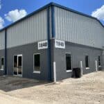 Warehouse exterior with texture finish, showcasing durability and clean, modern design.