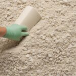 What are the main components that make up stucco