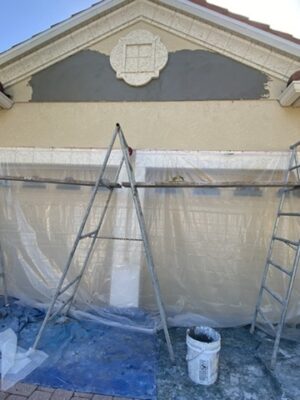 demo and repair wire lath and stucco on front gable