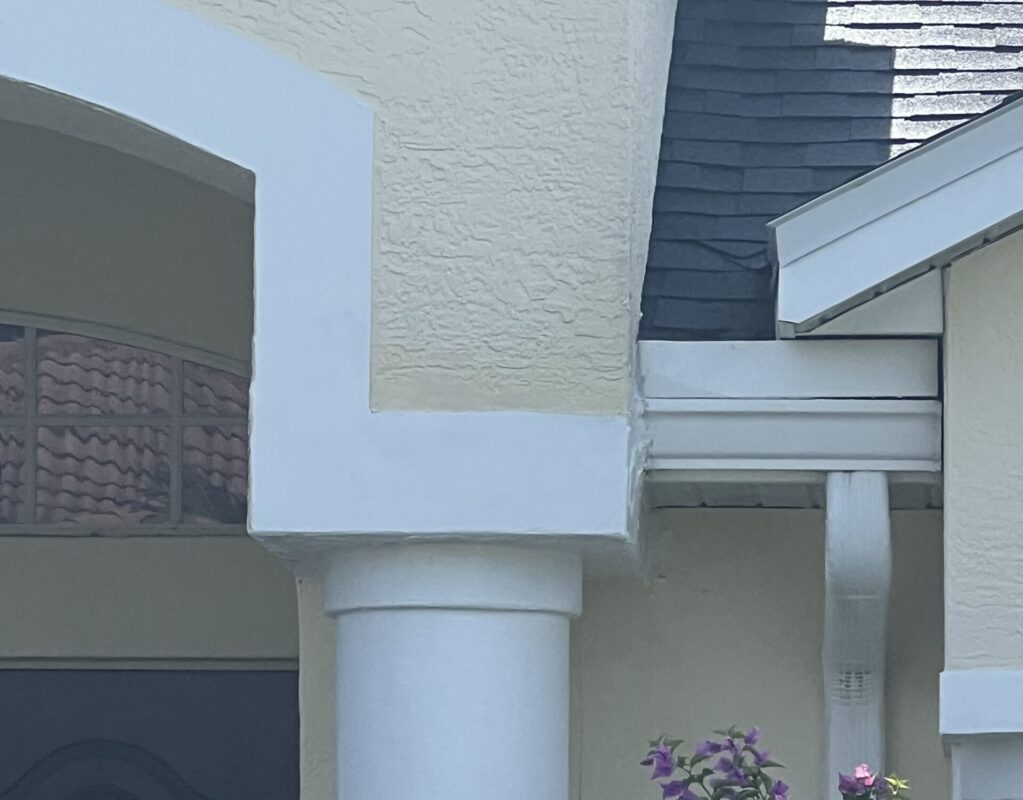 Completed stucco repair around exterior column on Florida home